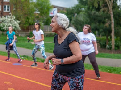 Woman running an exercise class