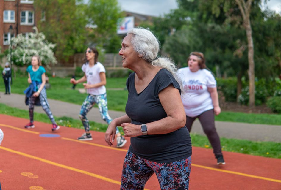Woman running an exercise class