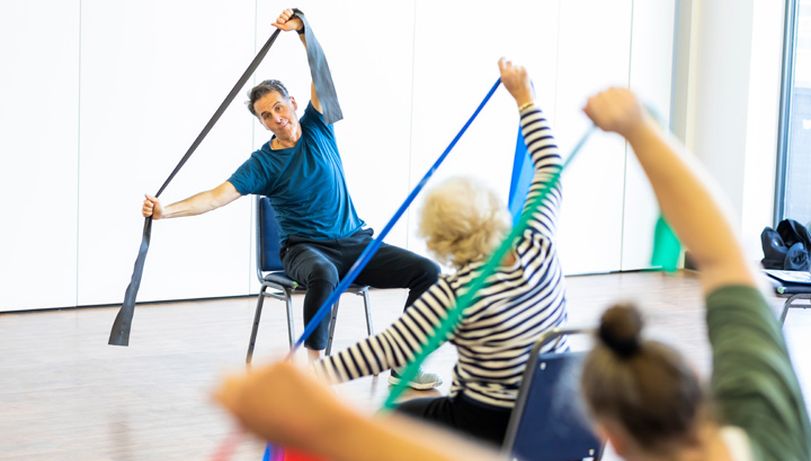 A fitness instructor leading a class