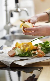 A woman chopping food