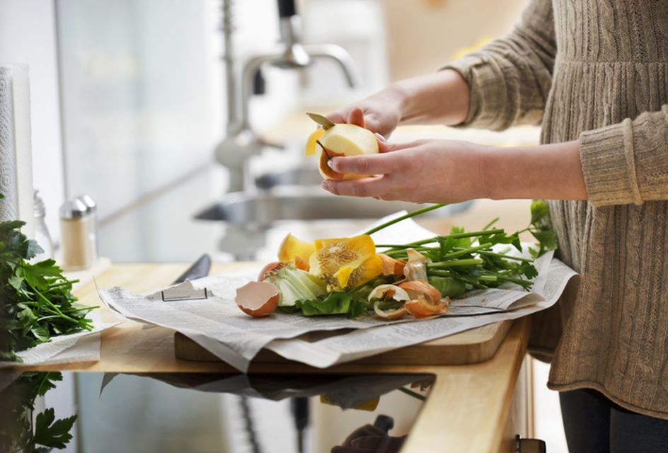 Hands of a woman cutting vegetables