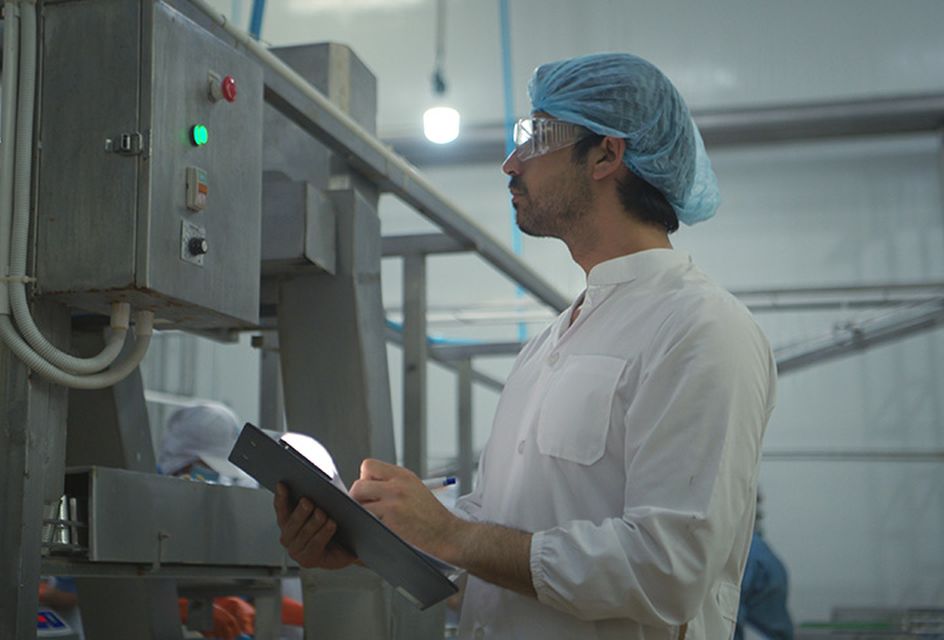 Food safety professional inspecting meat