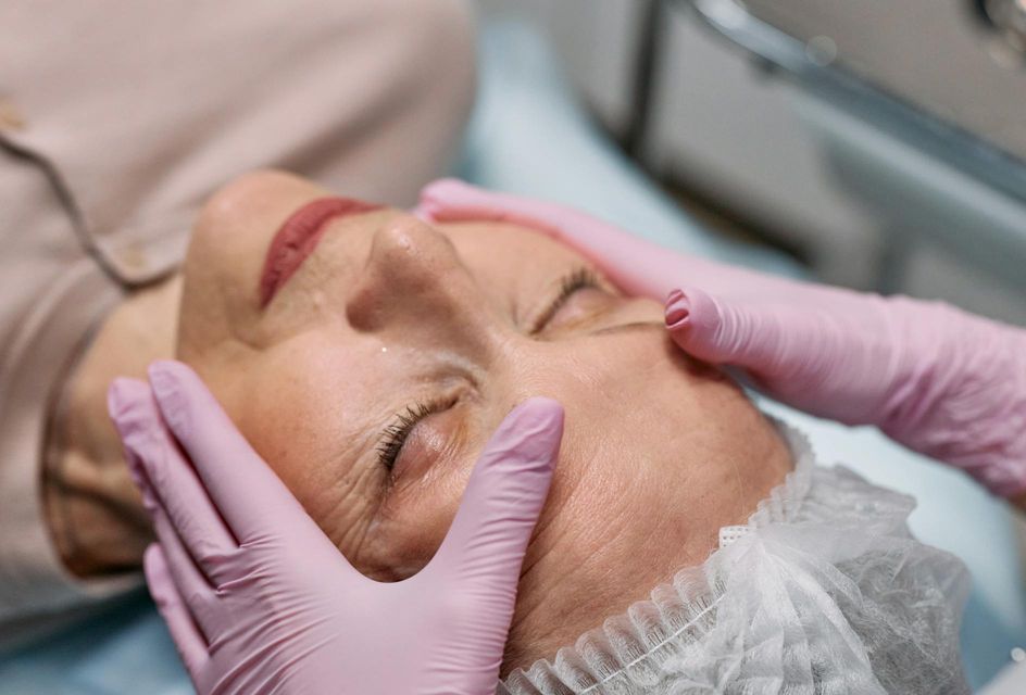 Woman undergoing a dermal filler procedure